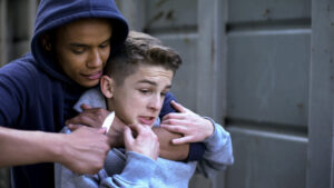 Juvenile assaulting young boy.