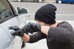 A man committing car theft in New Jersey.